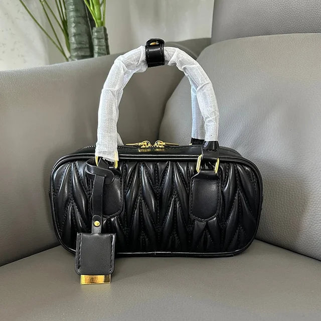 Women-Upgraded-Leather-Pleated-Boston-Handbag-Brand-Design-Metal-Letters-Large-Capacity-Ladies-Shoulder-Bag-Exquisite.jpg_640x640_d9b32ab6-dbeb-41f7-9112-6c298f81cf90.webp