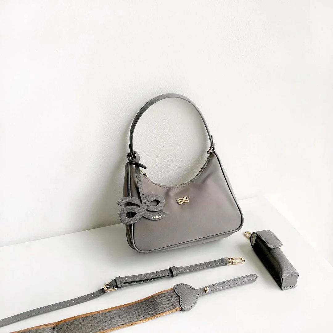 Women-s-Thailand-Designer-Vintage-Aesthetic-Messenger-Light-Luxury-Handbag-Y2k-Dumpling-Mini-Small-Shoulder-Underarm.webp